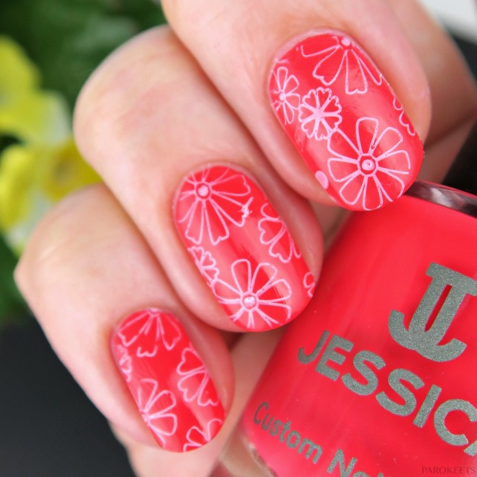 White flowers on coral pink nails (Jessica Runway Ready)