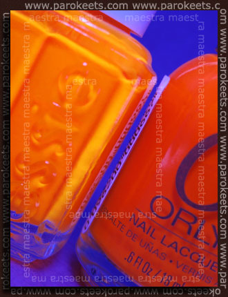 Orly - Orange Punch vs. Essie - Bright Tights Under blacklight: Orly - Orange Punch vs. Essie - Bright Tights