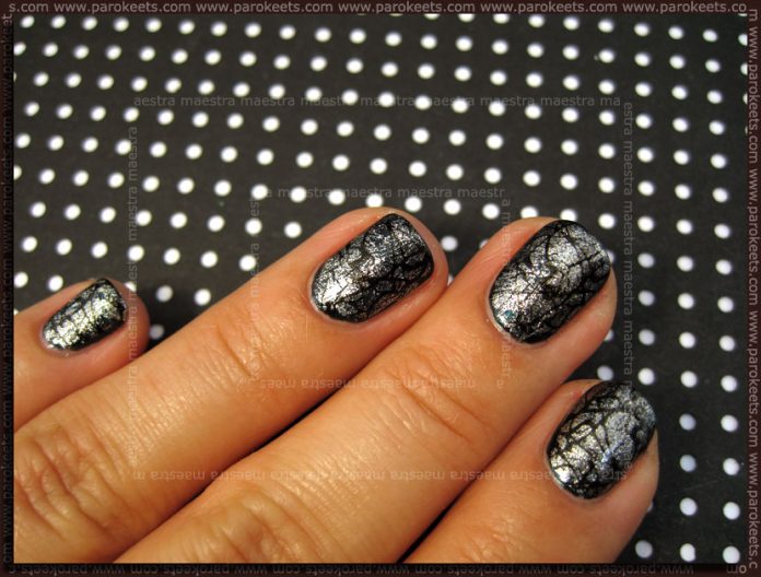 Pirate's manicure: OPI - Silver Shatter over Essie - Dive Bar and Konad - m70